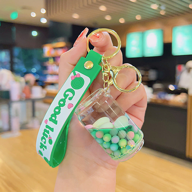 Wholesale Green Quicksand Bottle Into Oil Floating Acrylic Keychains